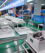 High-tech offshore manufacturing facility with assembly lines in action.
